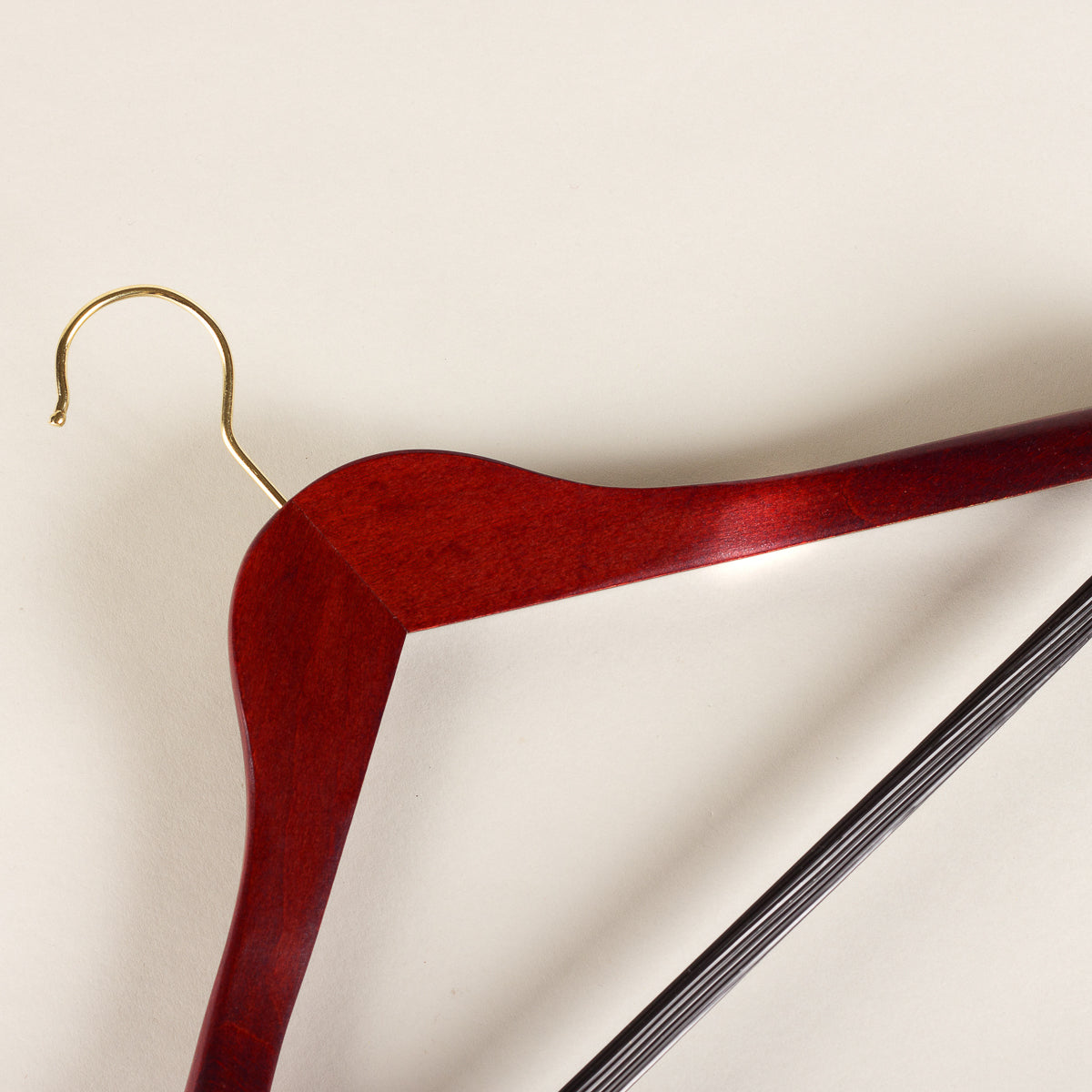 Suit and jacket hanger - mahogany with trouser bar